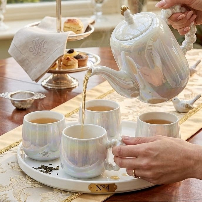Nine piece luxury purple tea set with marble style finish, gold detailing, and matching tray for serving tea or coffee.