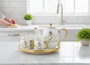 8 Piece Rotating tea set with cups and accessories