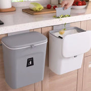 Wall-mounted kitchen trash can with lid in grey and white for space-saving waste disposal