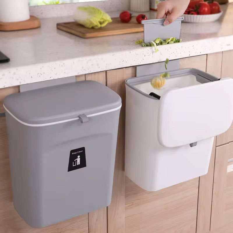 Wall-mounted kitchen trash can with lid in grey and white for space-saving waste disposal