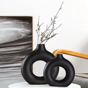 Porcelain ceramic 2 in 1 donut flower vase with a modern minimalist design for floral arrangements and home décor.