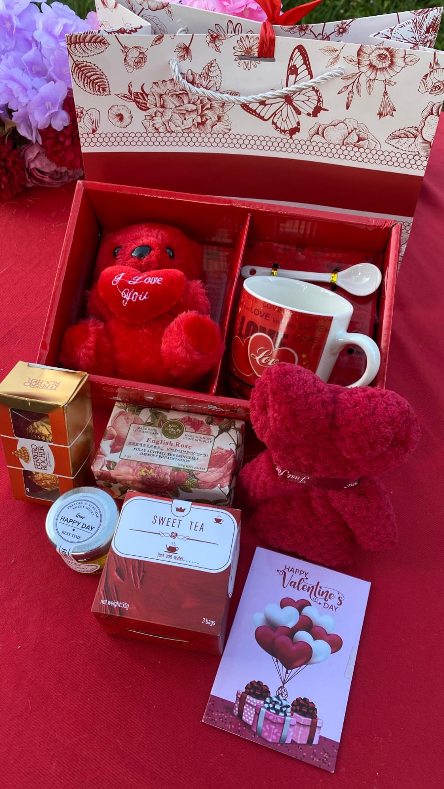 Valentines ladies gift set with chocolates, honey jar, bear doll, tea bags, bear towel, soap, card, and gift bags