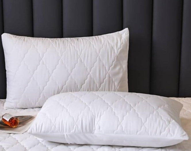 Pair of standard size waterproof pillow protectors in white and grey