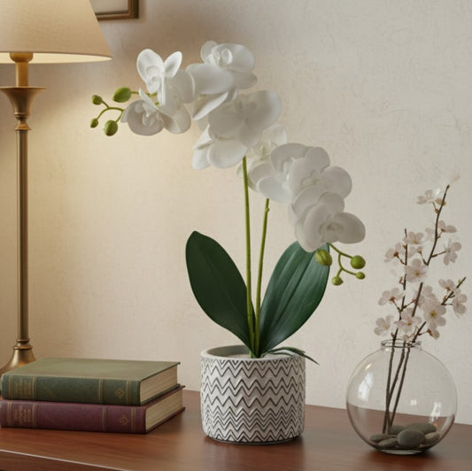 Ceramic vase with a realistic orchid arrangement for home or office decor