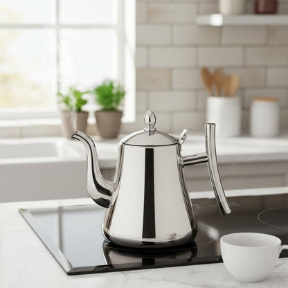 Elegant 700ml stainless steel kettle for boiling water and serving hot beverages.