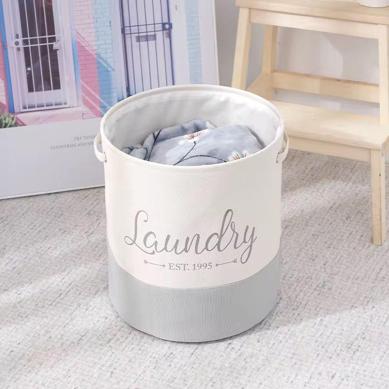 Large round storage basket for toys, clothing, or laundry in black and grey colors