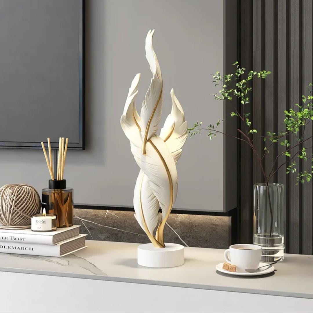 Dawood Lifestyle & Gadgets kes white and gold twisted feather resin sculpture with round base for tabletop and console decor