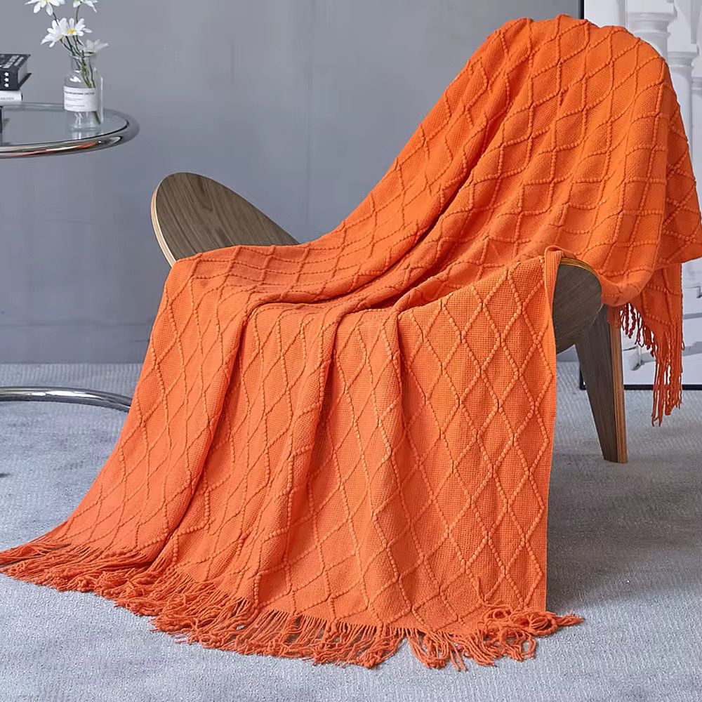 Knitted decorative throw blanket in assorted colors