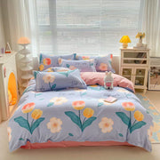 Printed cotton 4 piece duvet cover set in 6 × 6 ft size including one duvet cover, one bedsheet, and two pillowcases.
