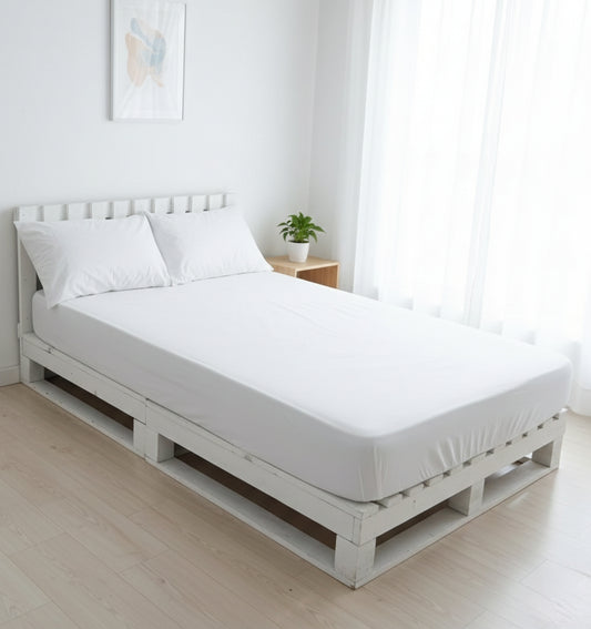 Fitted cotton bedsheet with two matching pillowcases in solid neutral colors