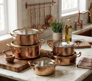 9-piece stainless steel cookware set with hammered pattern, non-stick interior, and stainless steel lids, compatible with all cooktops