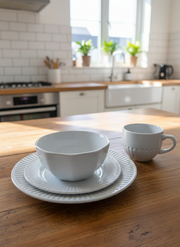 24-piece Dinner set with plates, side plates, bowls, and cups in assorted colours.