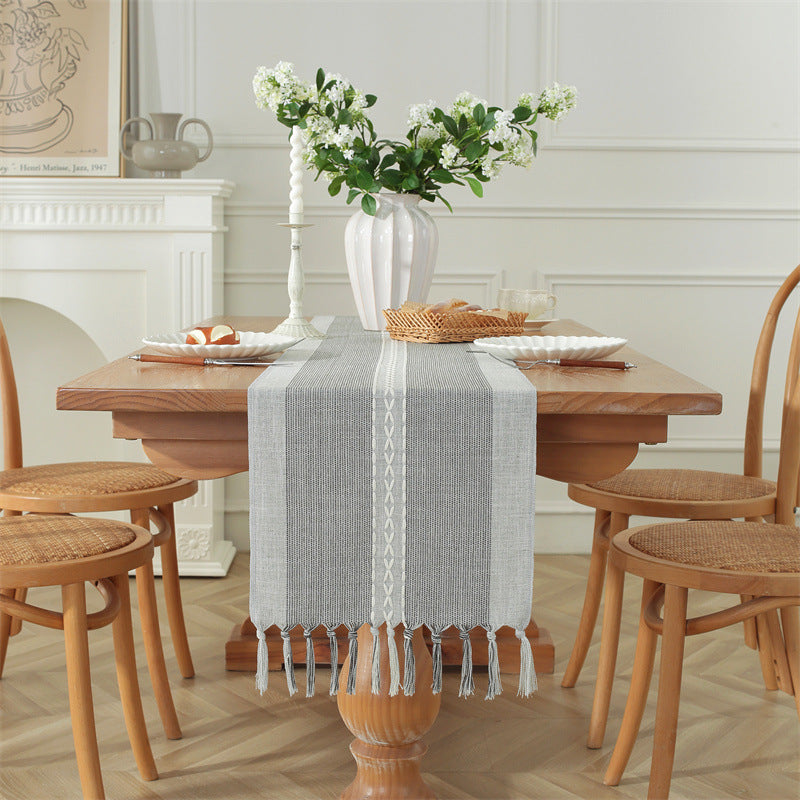 Rustic braided striped cotton linen table runner with tassels measuring 33 × 228cm