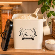 White airtight rice storage container with a 4 kg capacity, scoop, and side handles for storing rice and other dry foods.