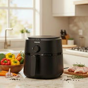 1000 Series 3.2L air fryer with 1300W power and RapidAir technology for healthier frying, baking, grilling, and roasting NA110/09.