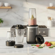 5000 Series 1000W blender with ProBlend Plus system, multiple tumblers and grinding cup for smoothies, coffee, spices, and portable blending.