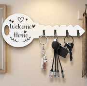 White: Welcome Home wooden wall mounted key holder with hooks in white, available in Nairobi, Kenya.