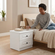 White Wooden Bedside Table with Two Drawers, Raised-Panel Fronts and Black Round Knobs, 50 × 45 × 35 cm, available in Nairobi, Kenya